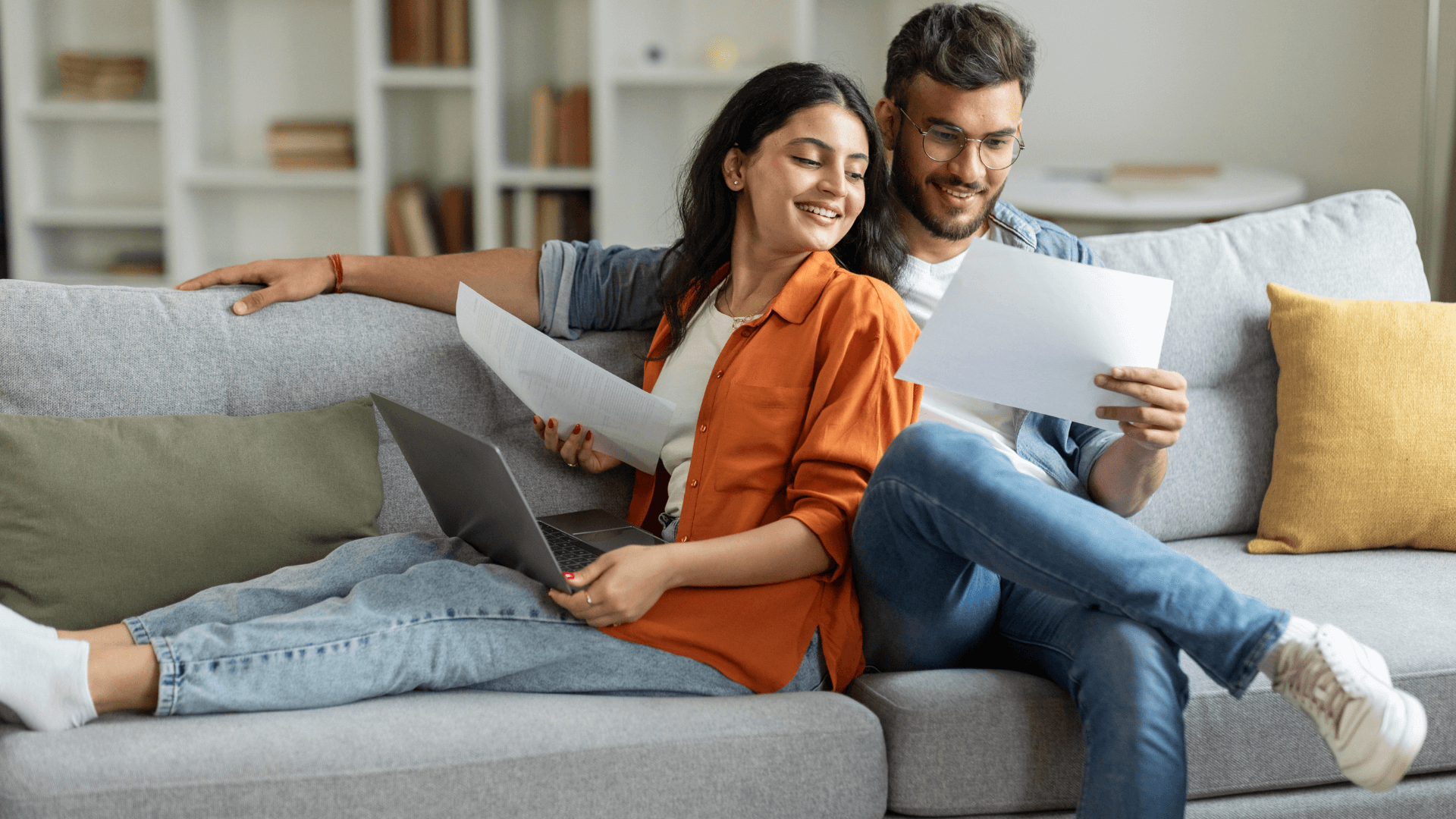 young couple sitting on the couch